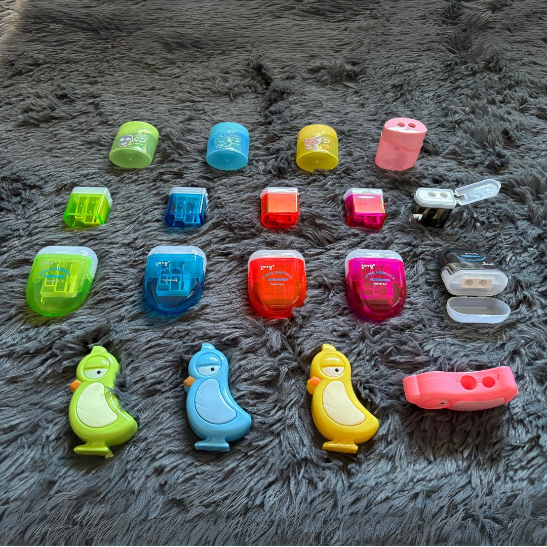 colorful pencil sharpeners, premium sharpeners for school, office supplies sharpeners, durable pencil sharpeners, compact sharpeners for students, art tools and accessories, vibrant color sharpeners, stationery supplies Singapore, non-toxic sharpeners, portable sharpeners for desks and bags.